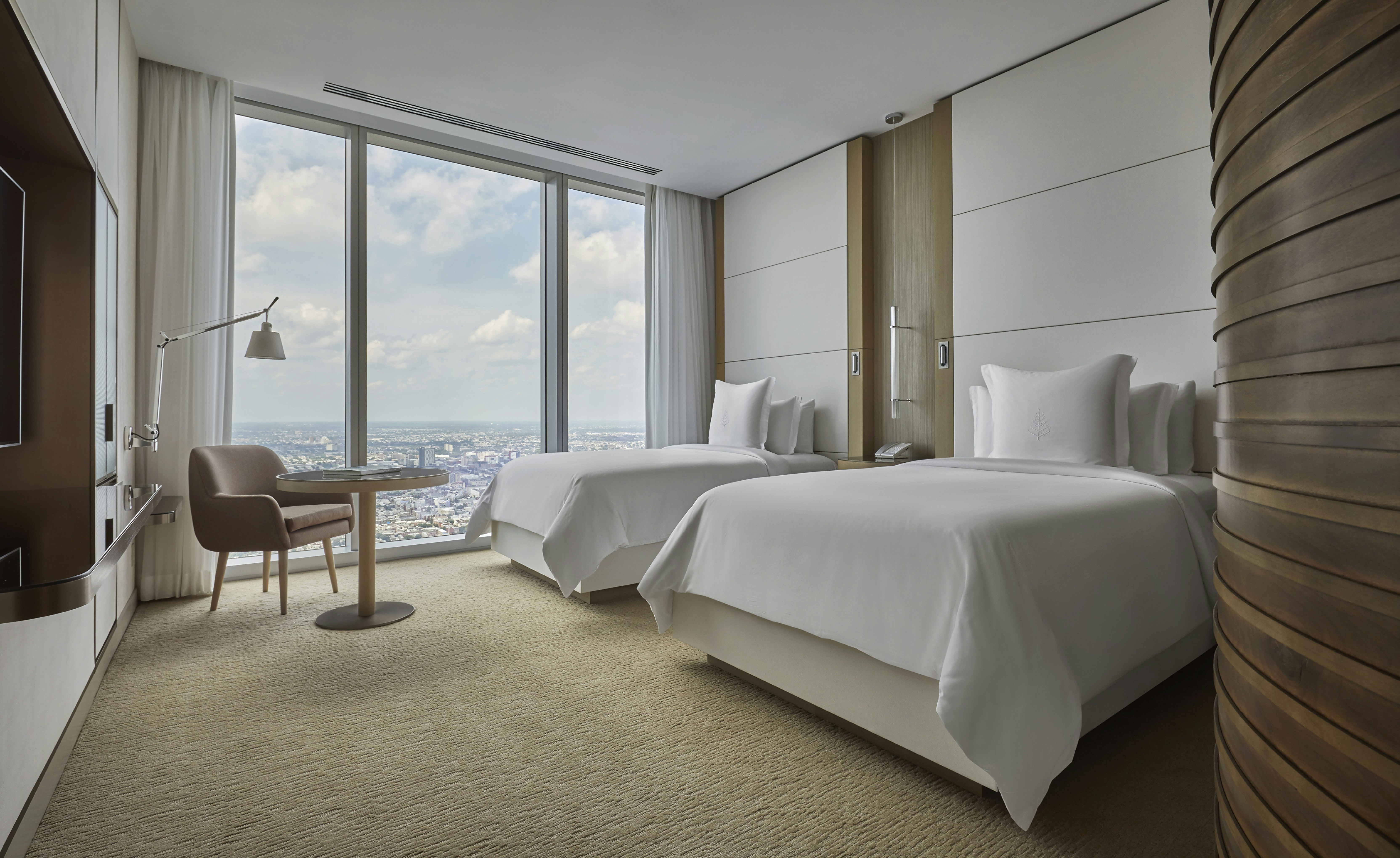 Grand Cityscape Room with two double beds