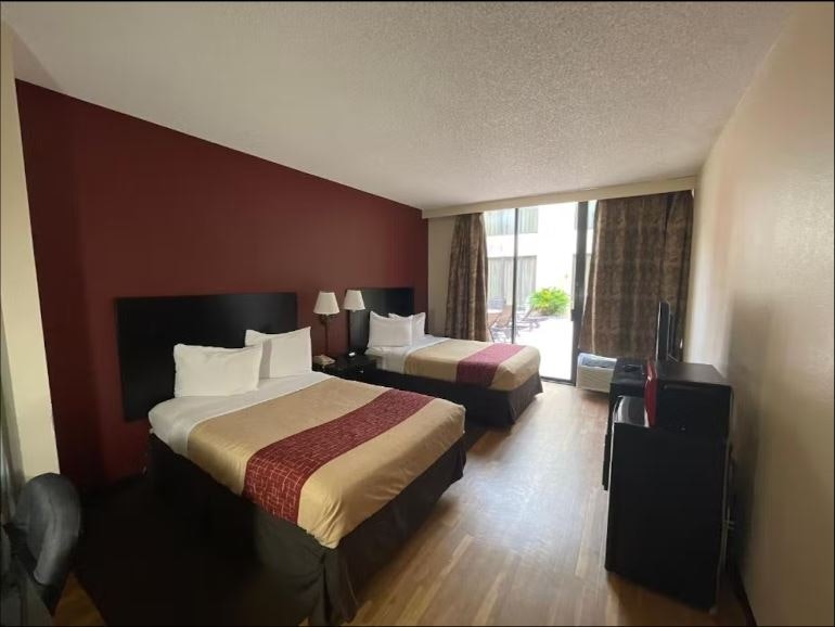 Two Double Beds Poolside