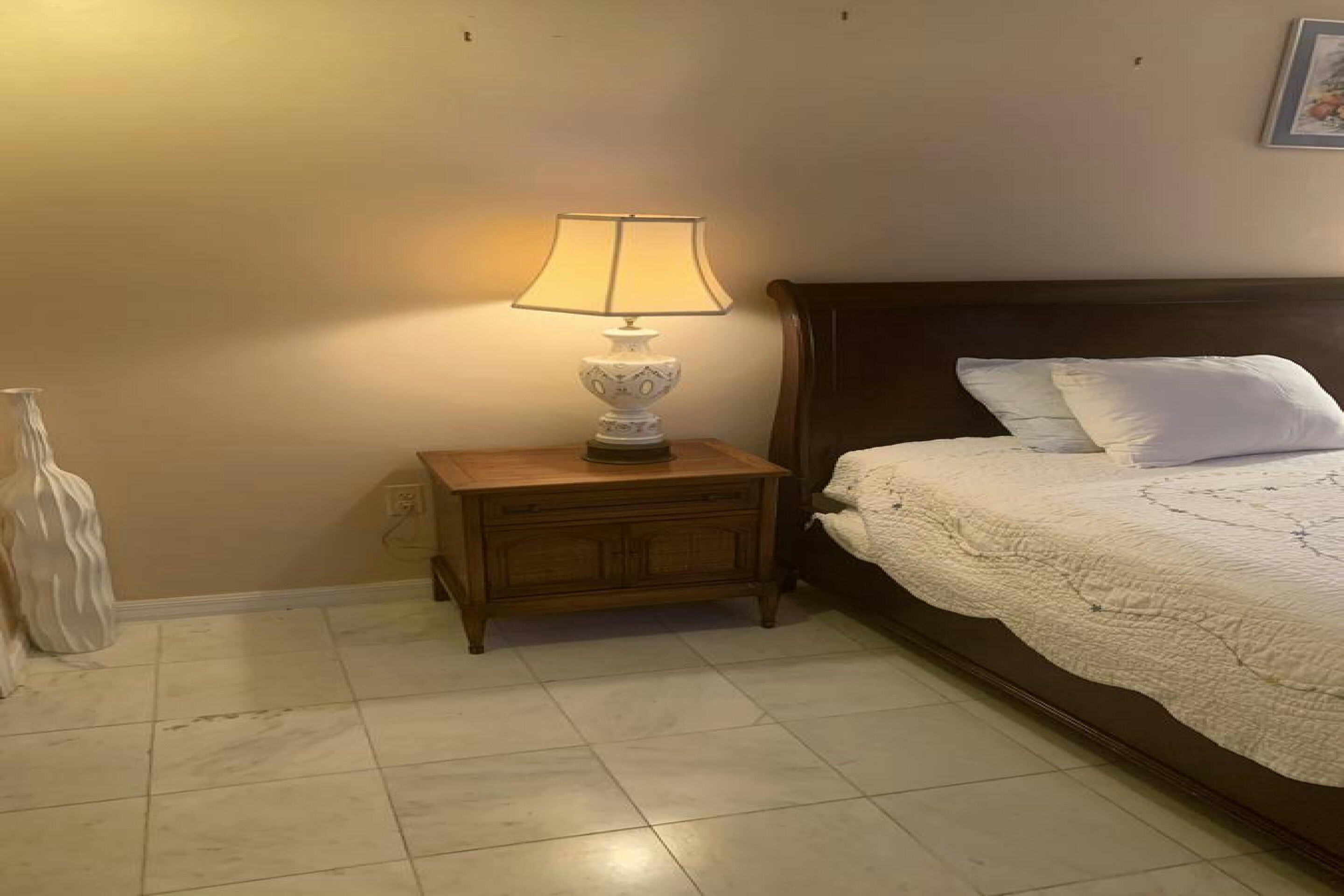 Queen Bed with Shared Bathroom