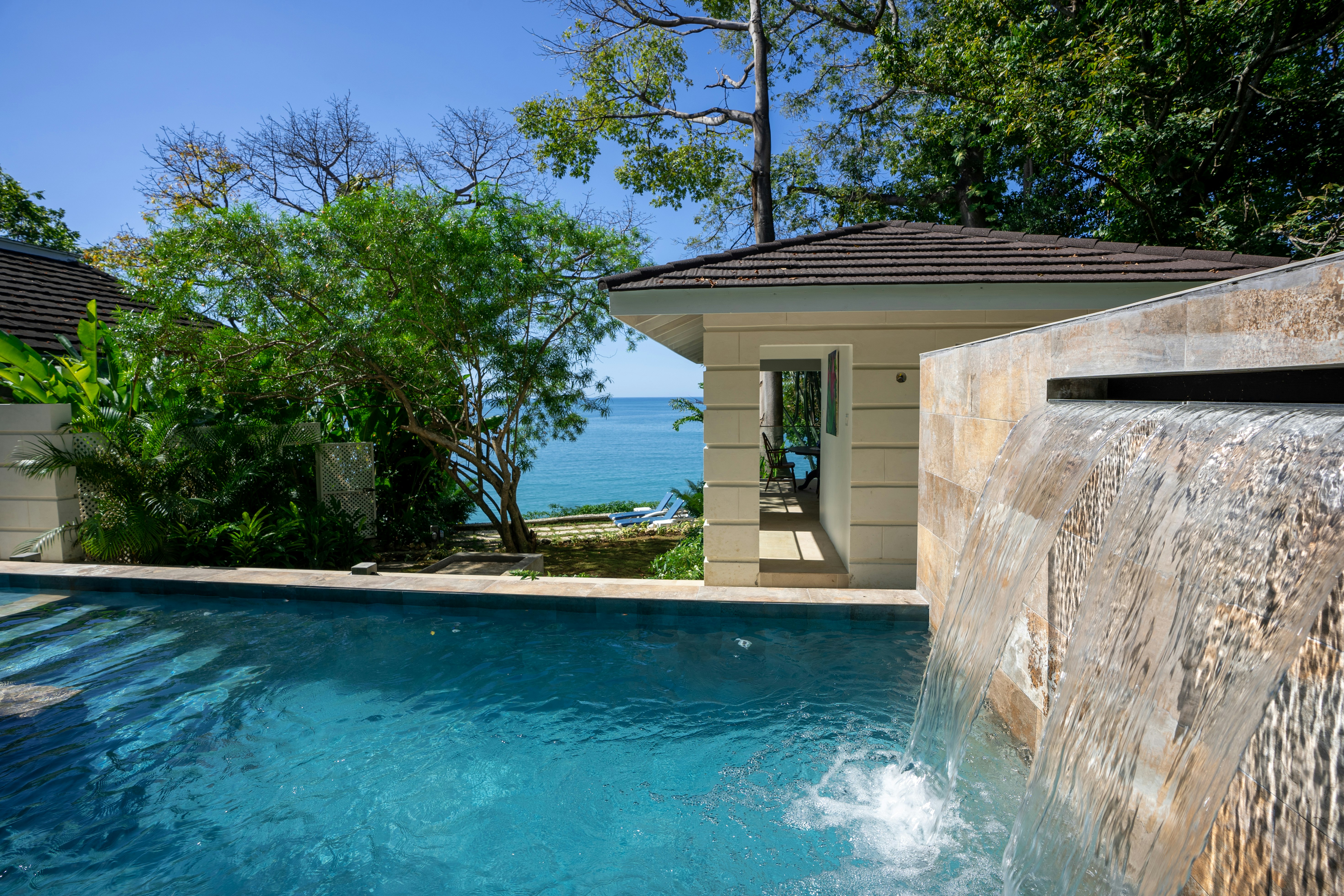 Cottonwood Pool Waterfall Looking At Dining Pavillion And Sea