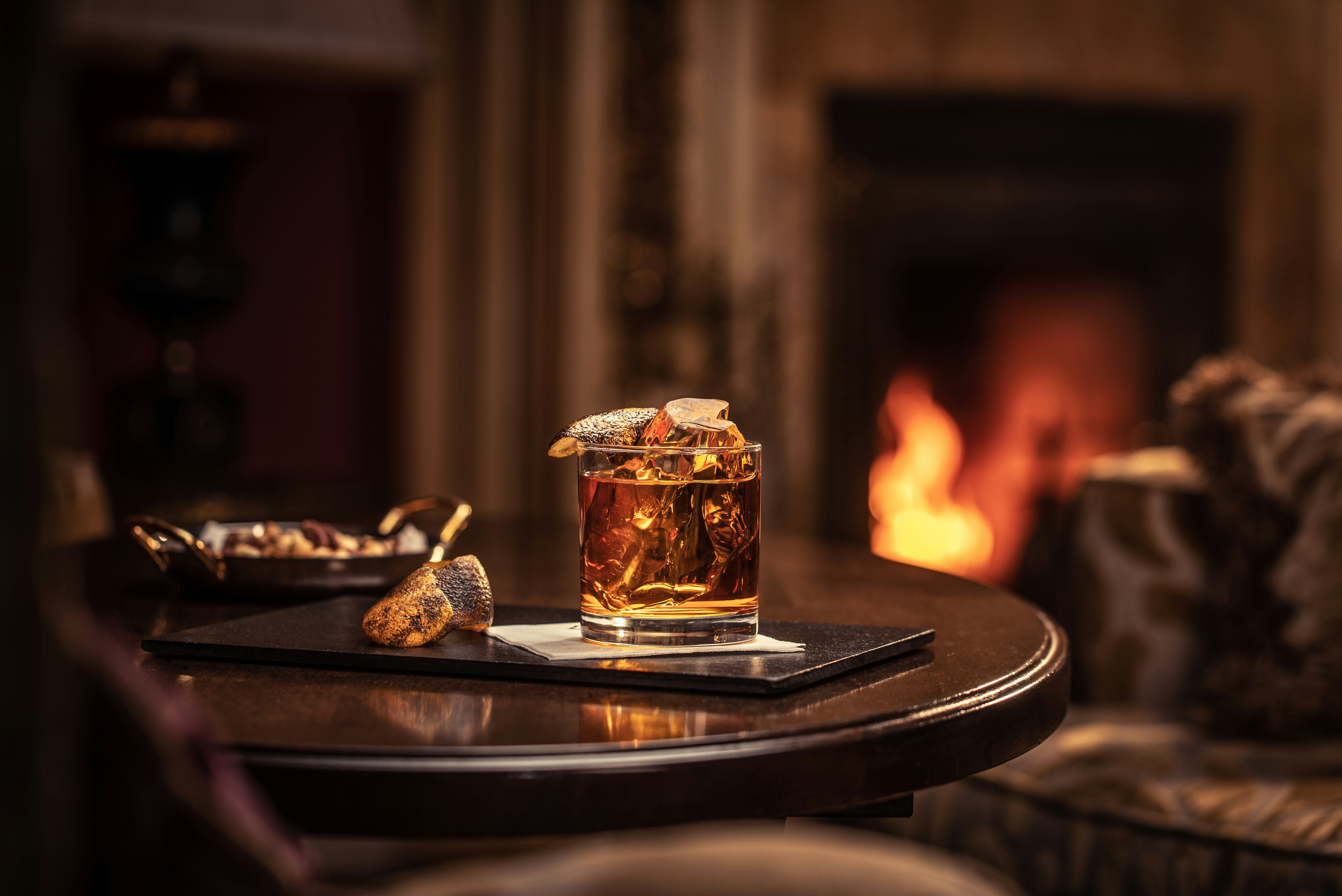 Negroni in the Bishops Parlour with a book or playing chess