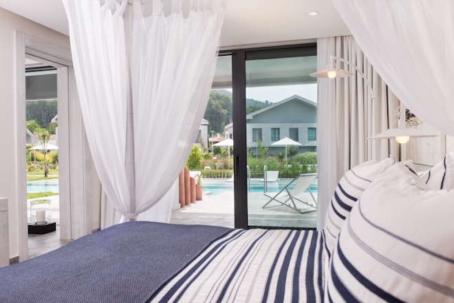 Premier Suite Pool Side Bedroom