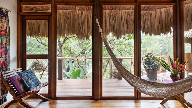 Gaïa Riverside Villa Bedroom Seating Area