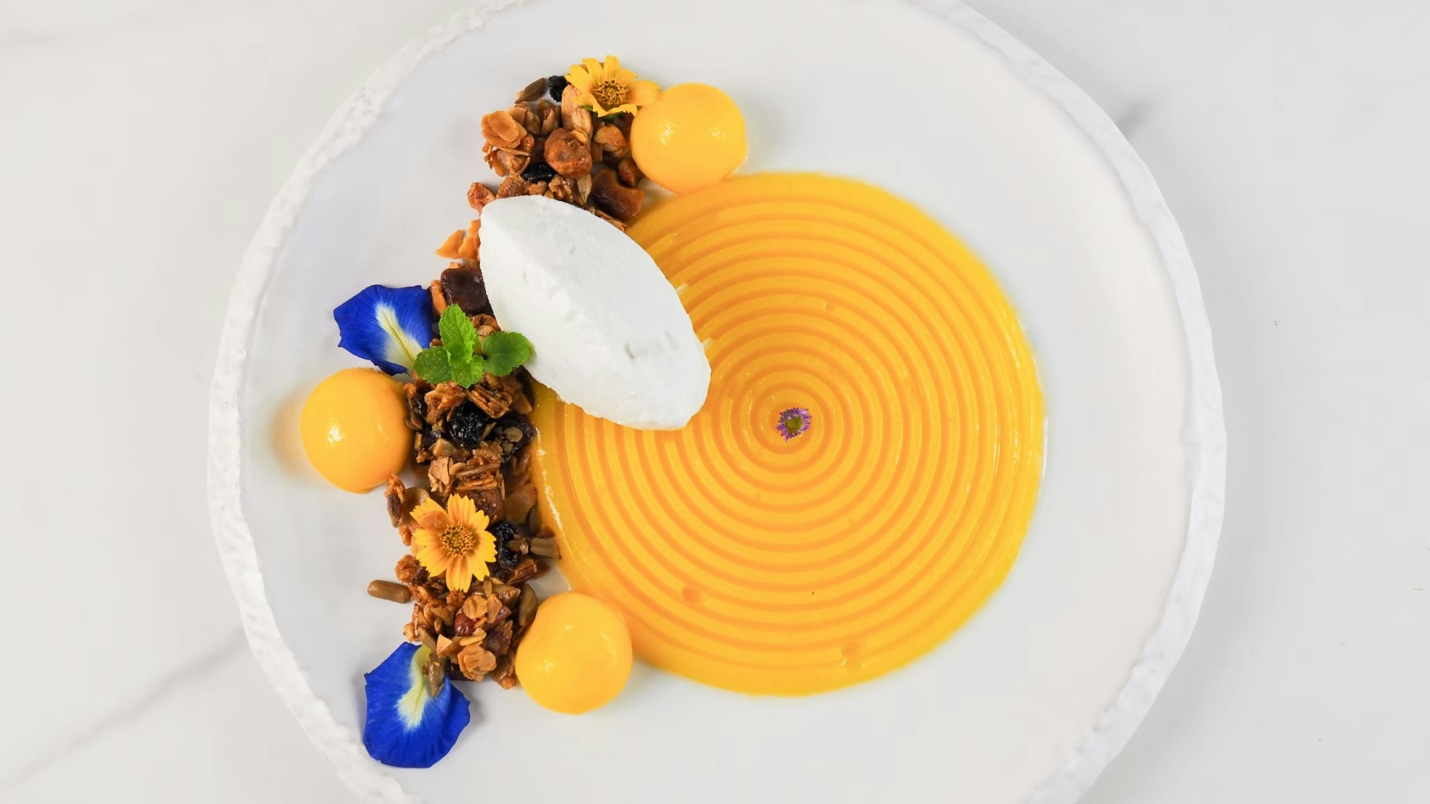 Mango Panna Cotta Served with Coconut Milk Ice Cream & Crispy Rice Granola *Seasonal Dessert*