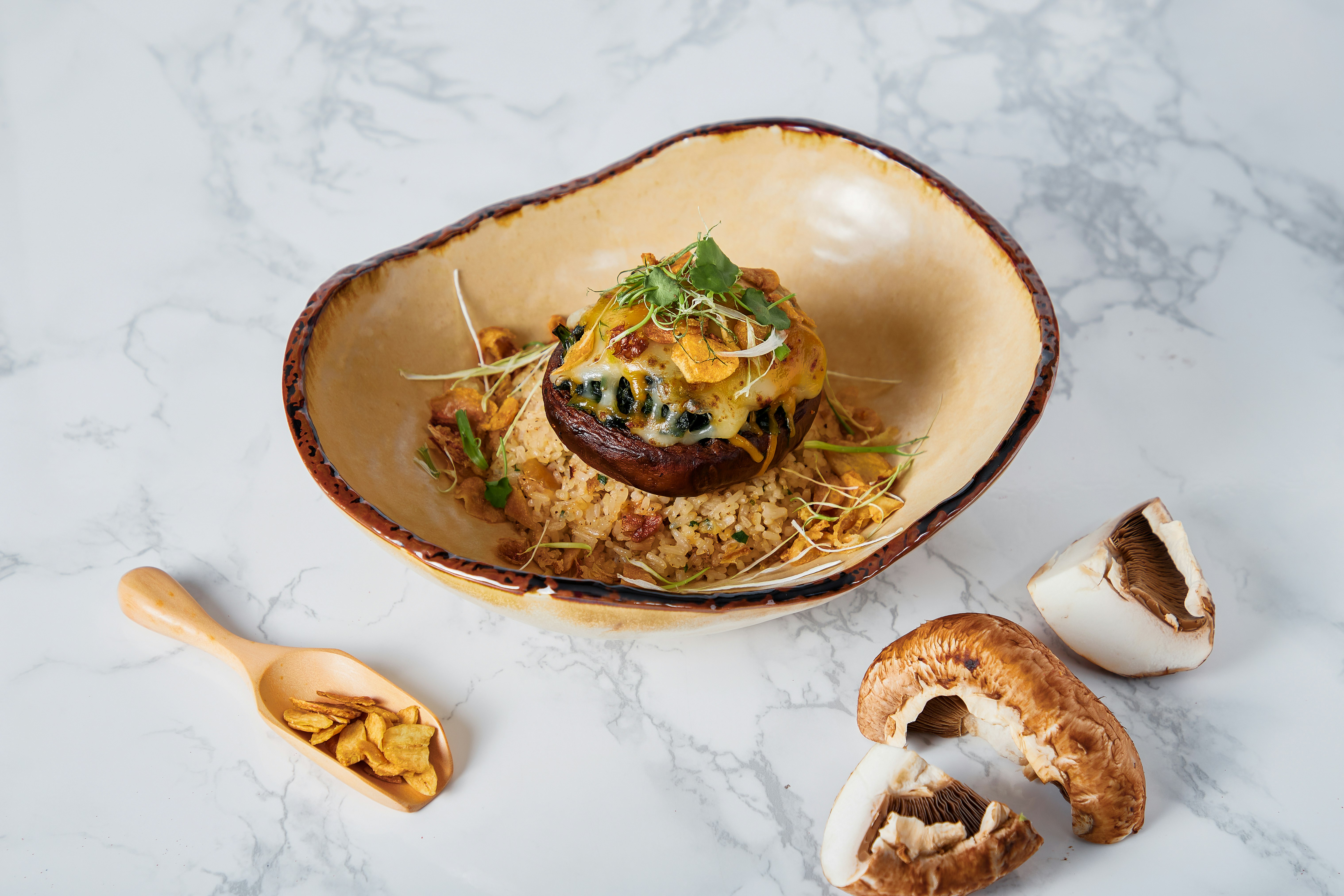 Garlic Fried Rice topped with Portobello & Spinach Gratin