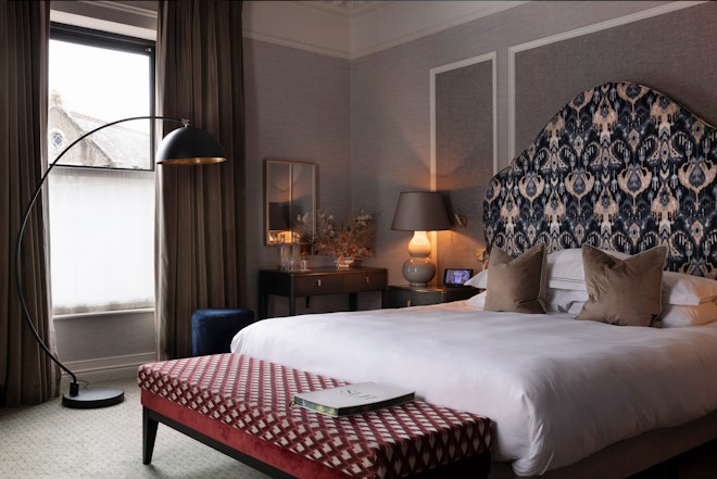 Signature Deluxe Room - Bedroom
