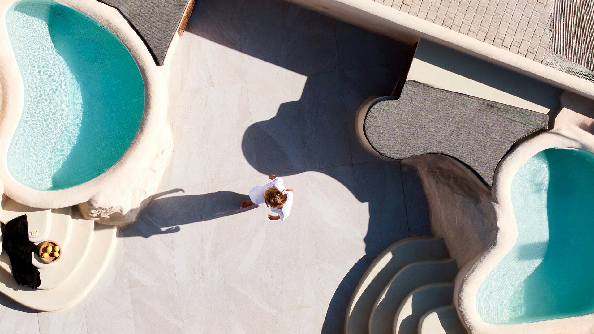 An architectural oasis captured from above, designed for pure relaxation