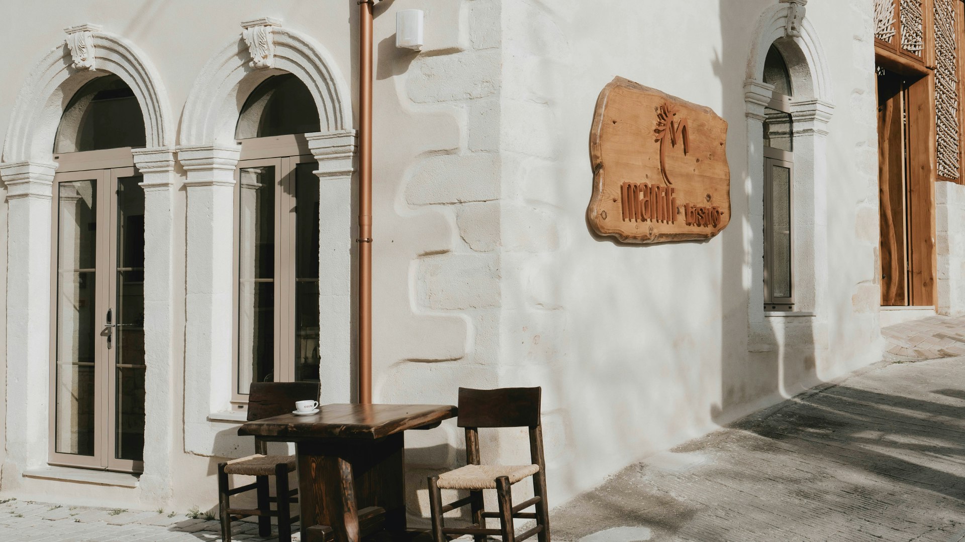 Authentic Cretan street view with Bistro entrance
