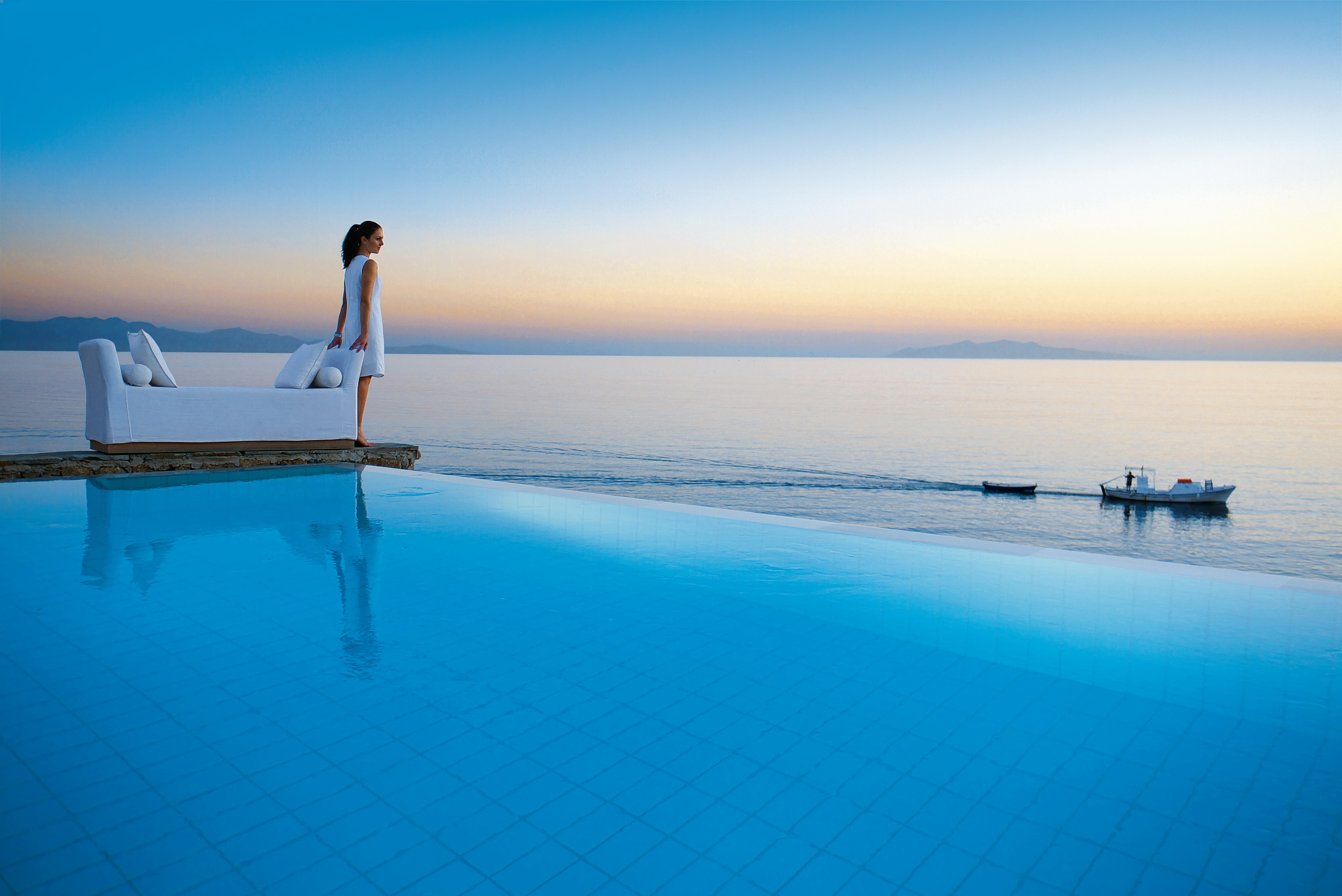 Two-tiered outdoor pool with Aegean Sea views