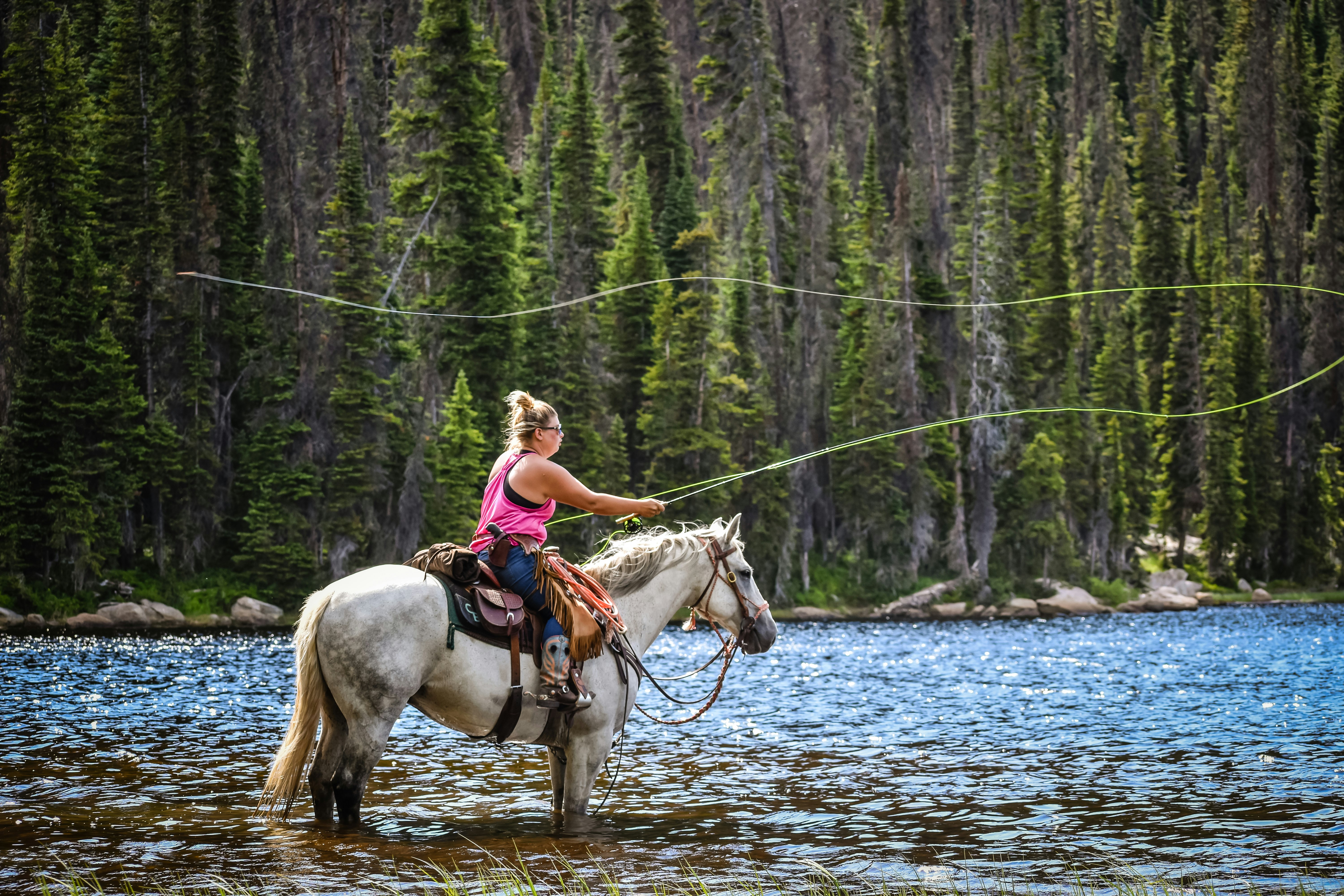 Cierra Fishing on Horseback