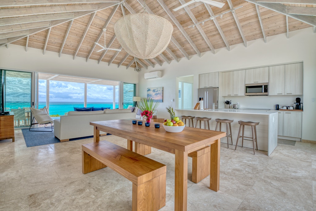 Three Bedroom Peninsula Oceanfront Coral Villa Kitchen Living Room View