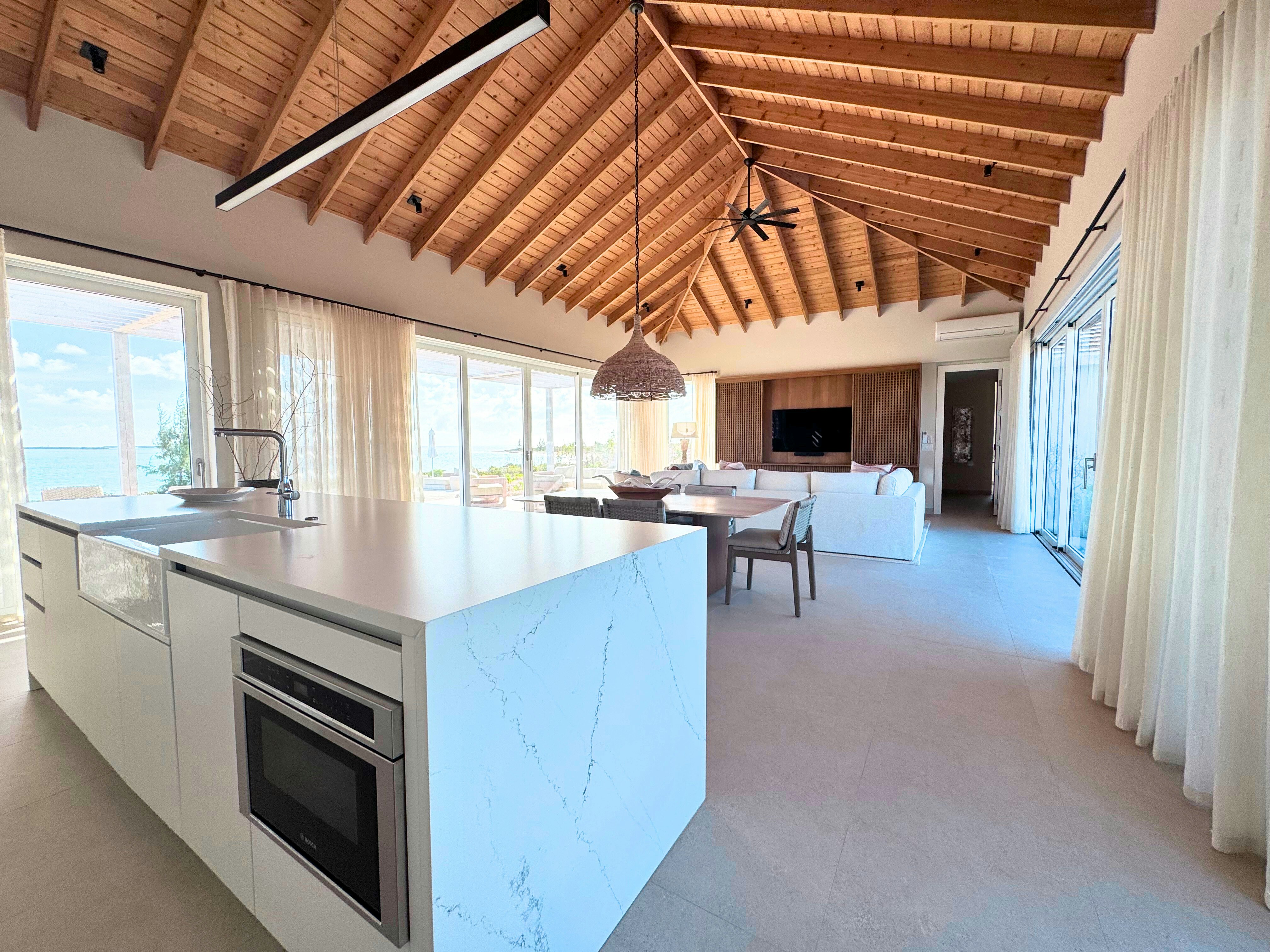 Caicos Bank Estate & Villa Suite - Kitchen & Living Area
