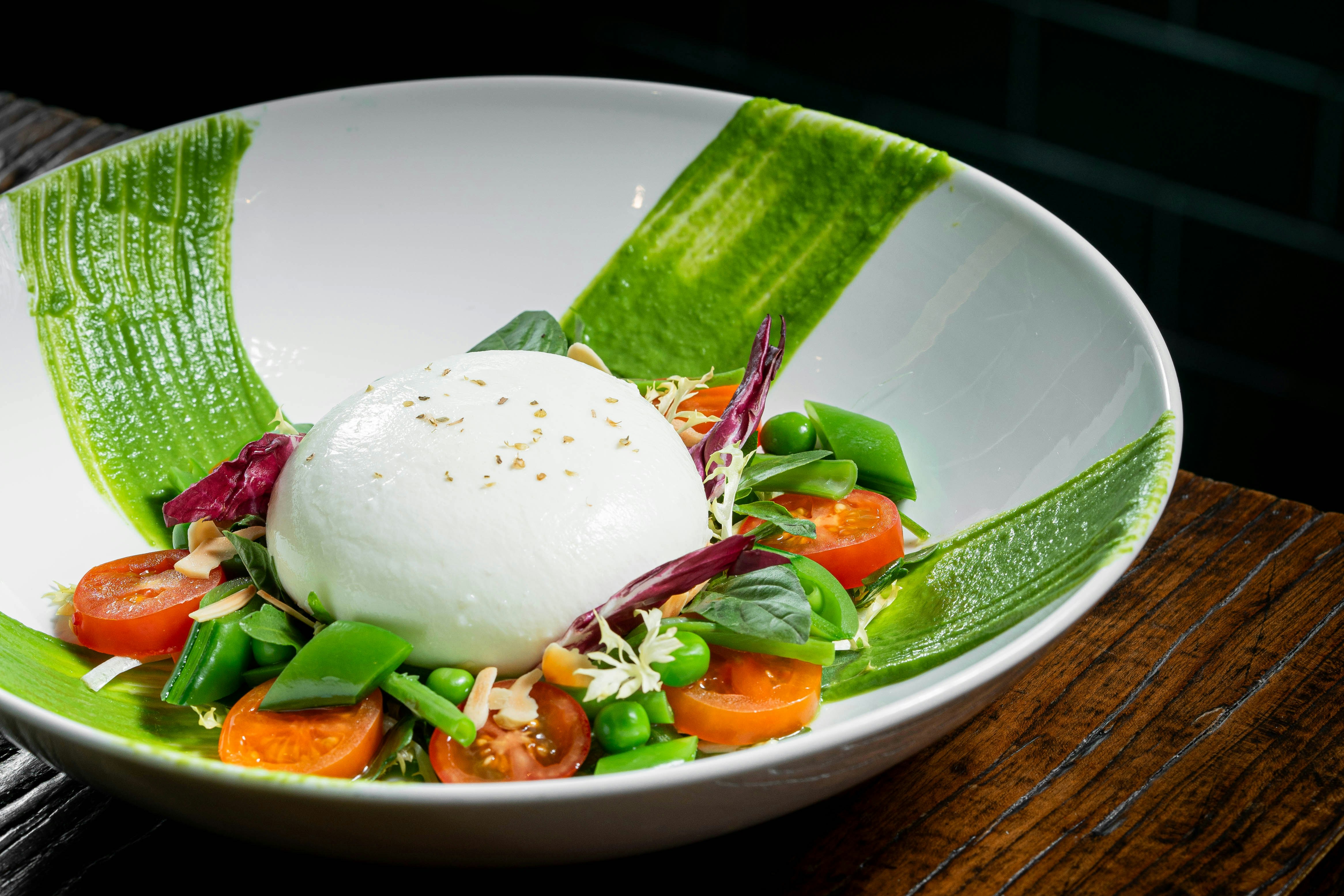 Burrata Salad, Green Pea Pesto, Tomatoes Almond Basil