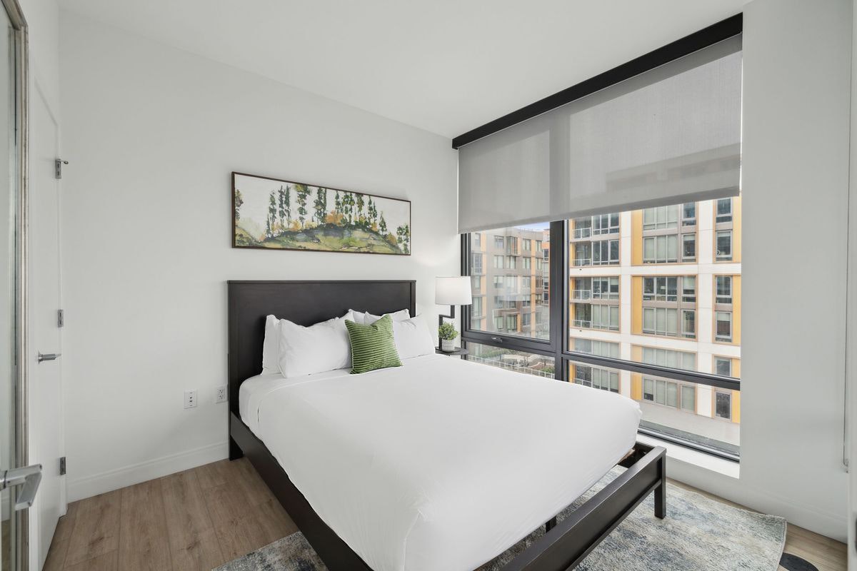 Premium One Bedroom Apartment with Den