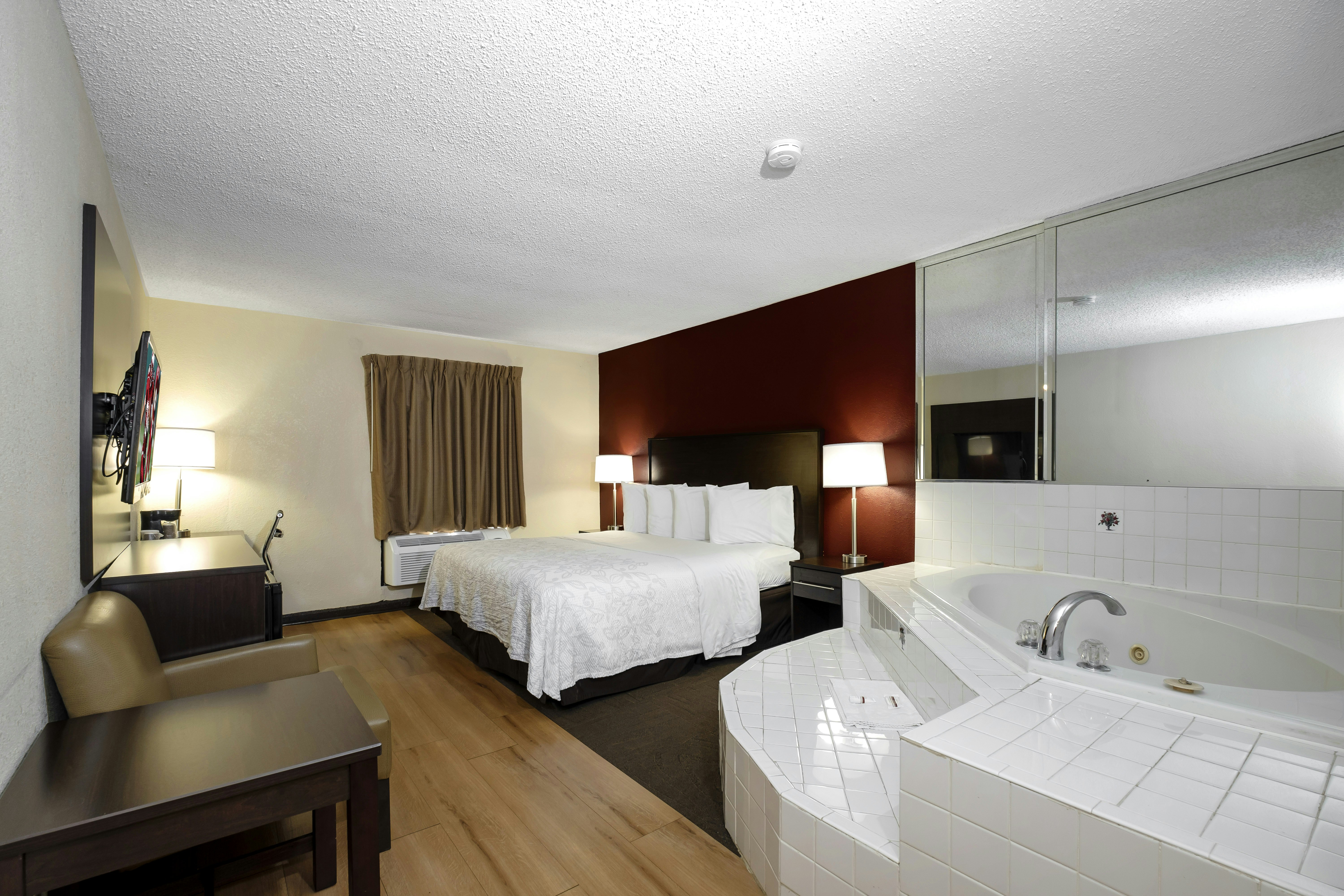 Premium King Bed Jetted Tub (Get More: Upgraded Bedding and Snack Box)